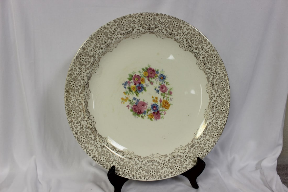 A 22 Karat Gold Plated Charger: 12 1/4" in diameter