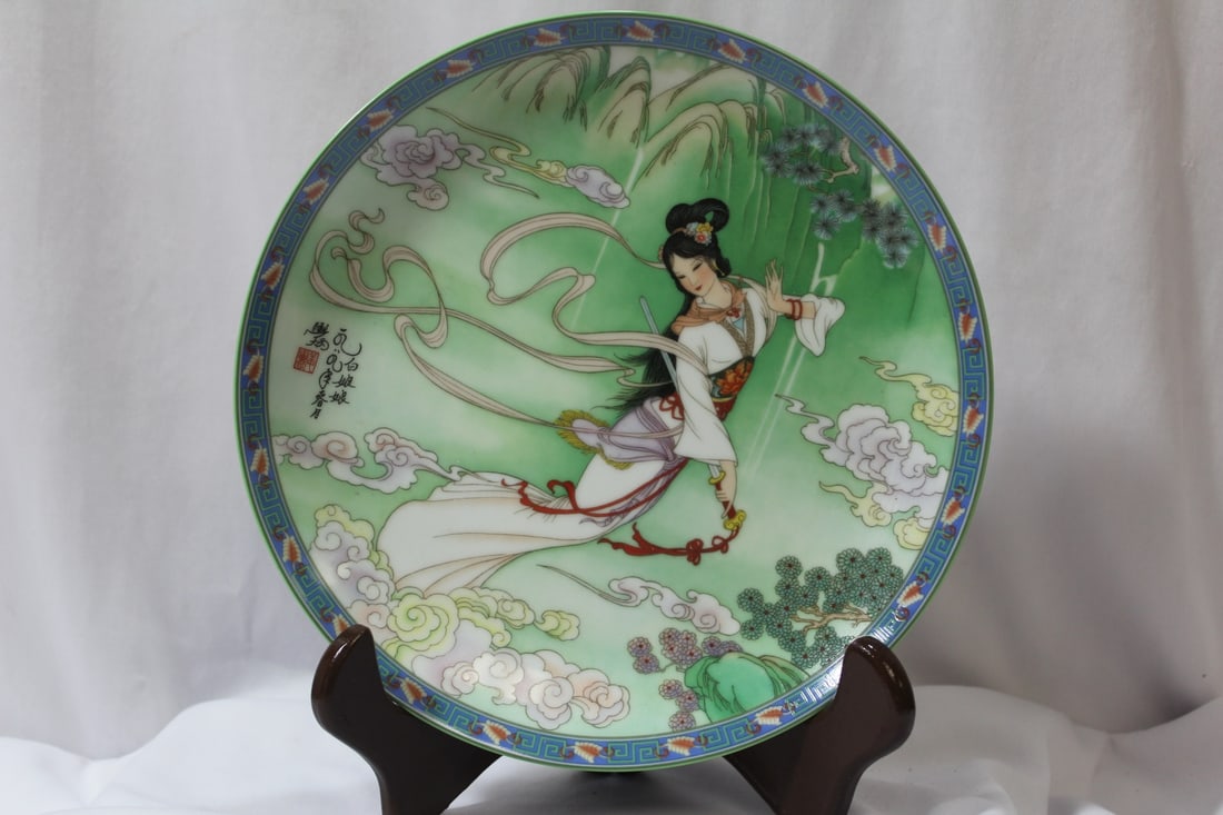 A Chinese Porcelain Plate: hand painted and signed - 8 1/2" in diameter