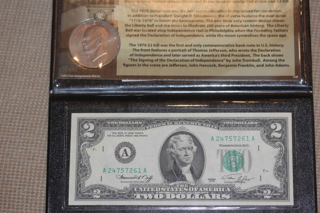 Clad Ike Dollar and a Bicentennial $2.00 Note: First commemorative Mint Inc - the first name in fine collectibles