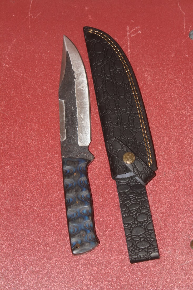 Knife with a Leather Sheath: overall= 13 inches long