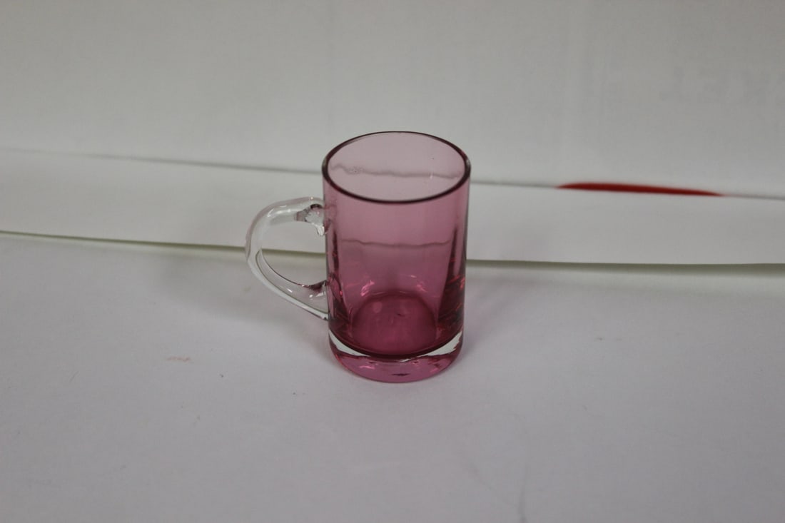 A Cranberry Colour Miniature Glass Mug: 2" tall
