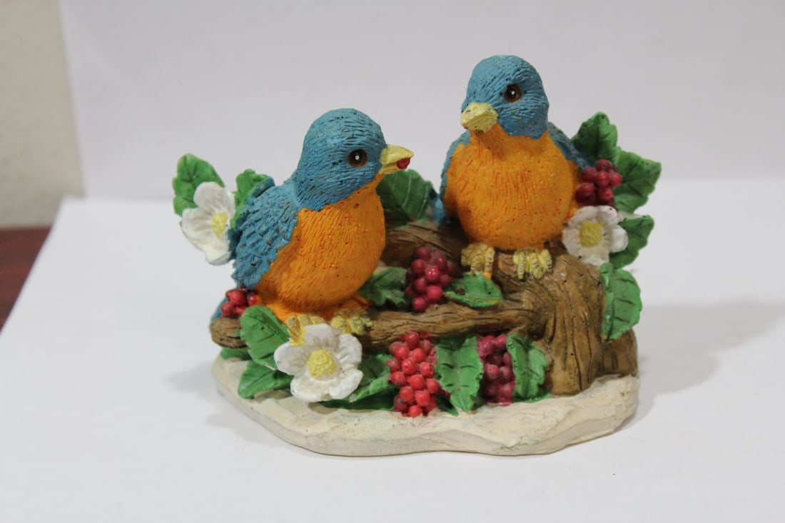A Heritage Pottery Bird Couple: nicely carved - 4 5/8" across