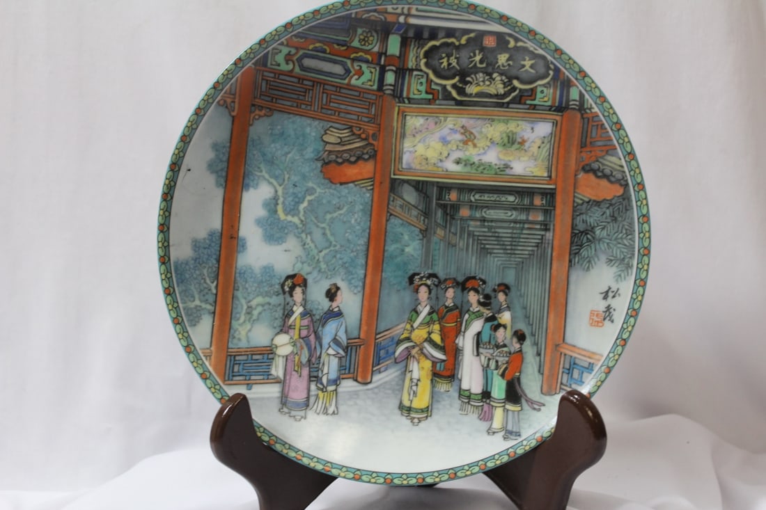A Chinese Porcelain Plate: hand painted and signed - 8 1/2" in diameter