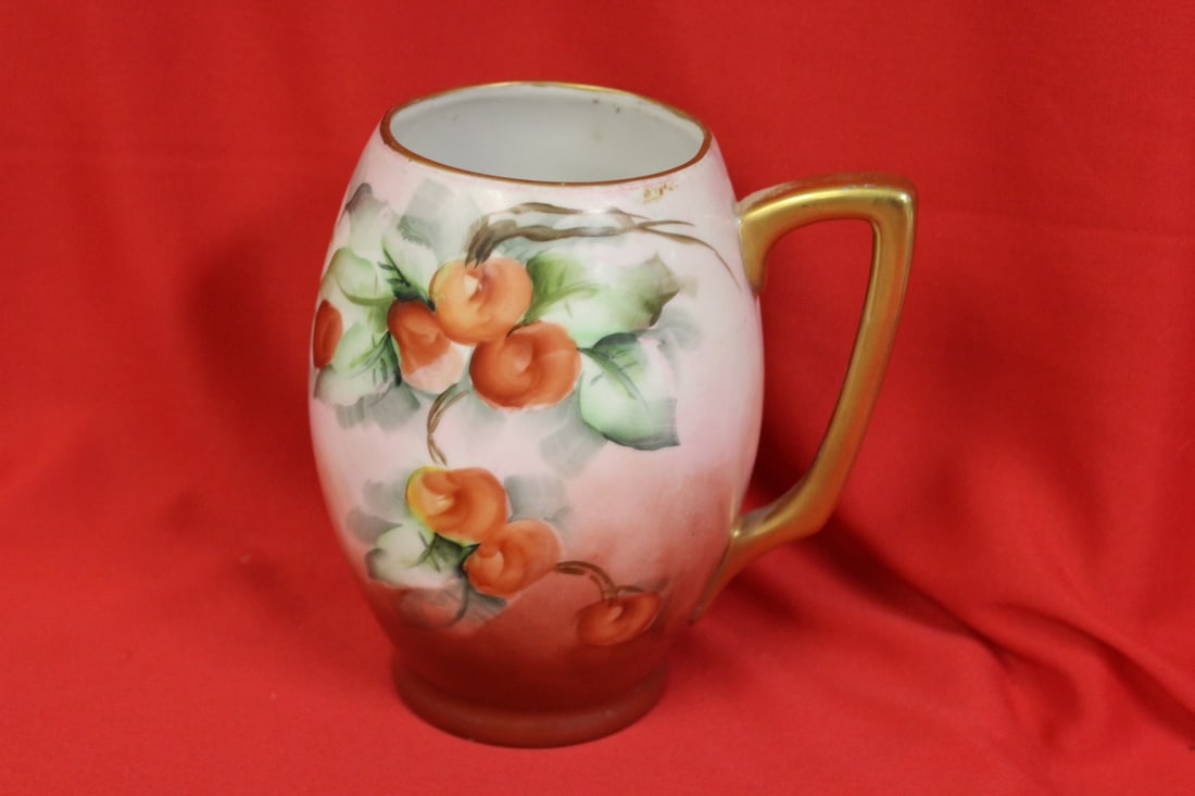 A Signed Porcelain Cup: handpainted 5 1/2" tall