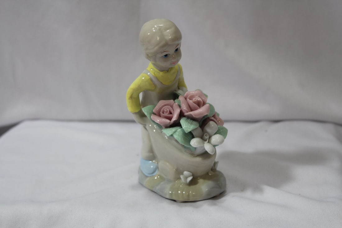 A Ceramic Figurine: 5" tall