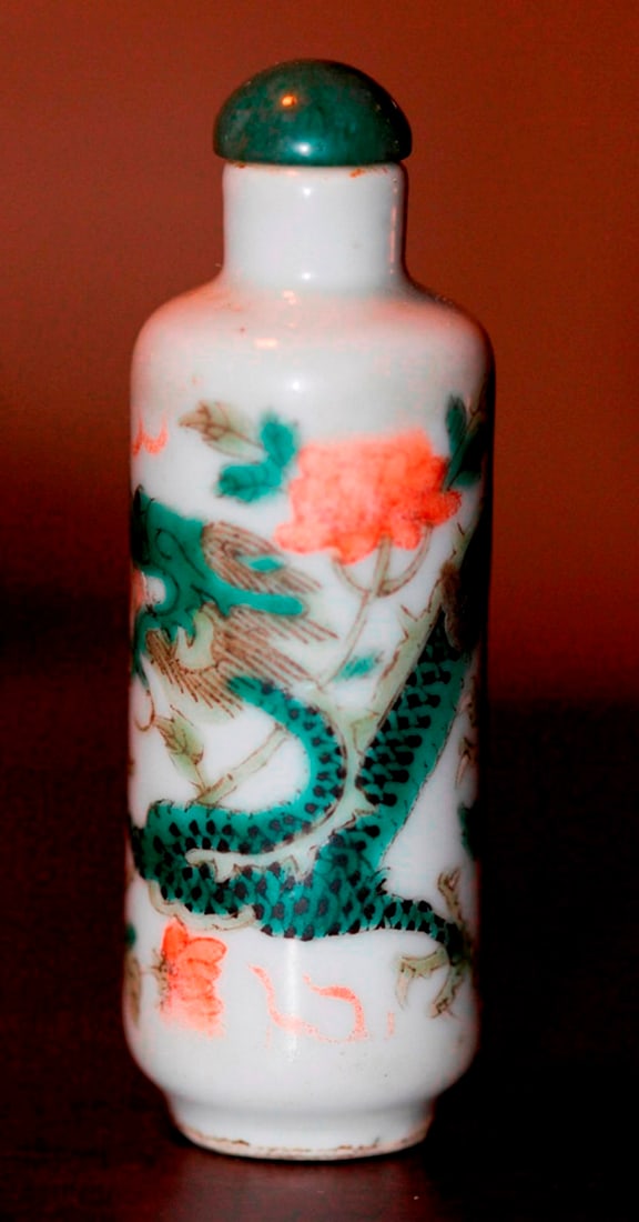Antique 18th Century Snuff bottle: Porcelain with green dragon. Measures 3 1/4" tall. Marked during period of Chin Leung reign.
