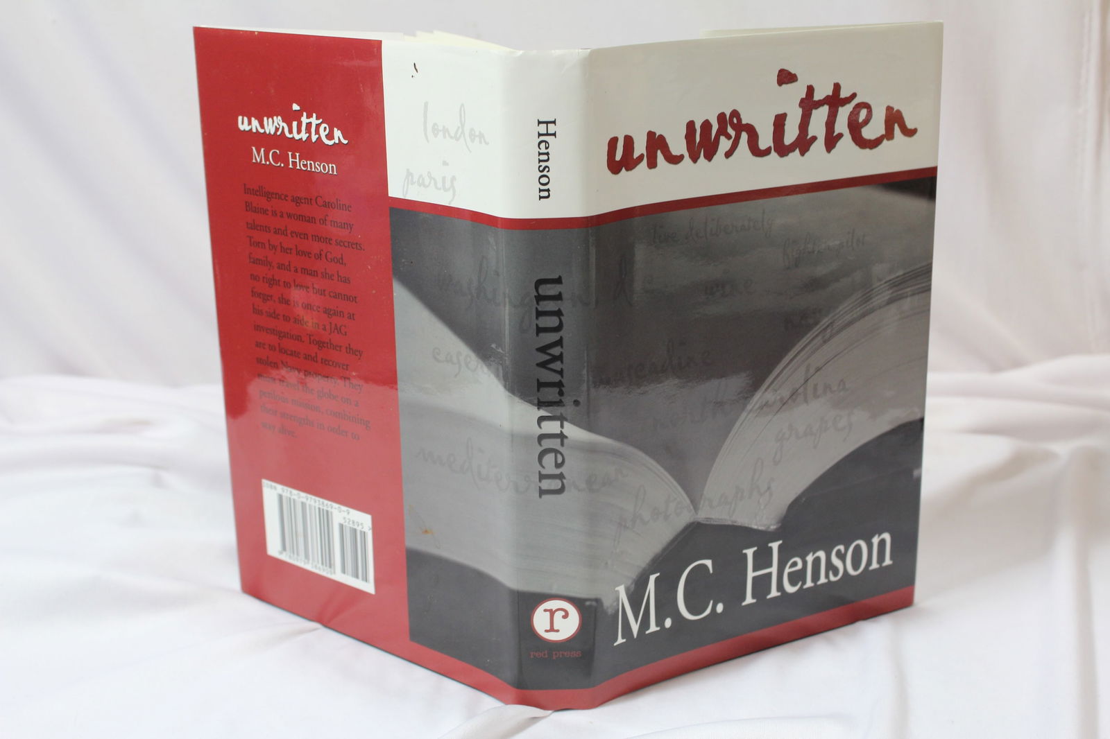 Unwritten - Hardcover Book: by M.C. Henson - author signed - autographed by author