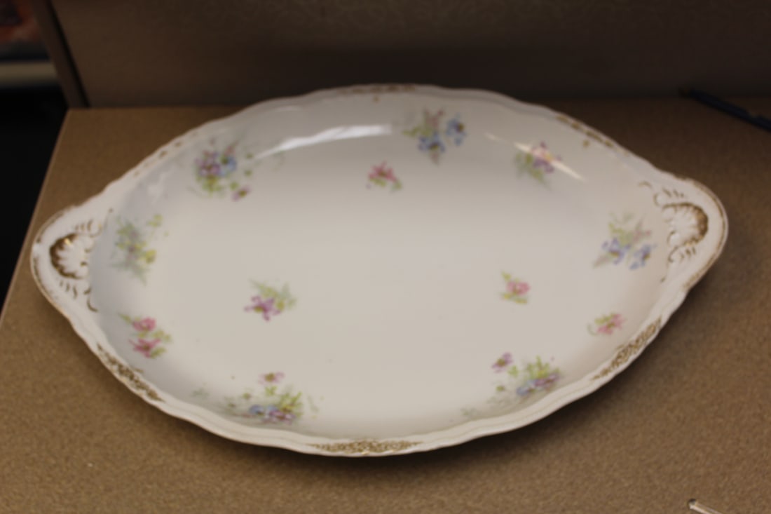 Large Limoge Platter: please note: chip and worn - 18 3/4" across