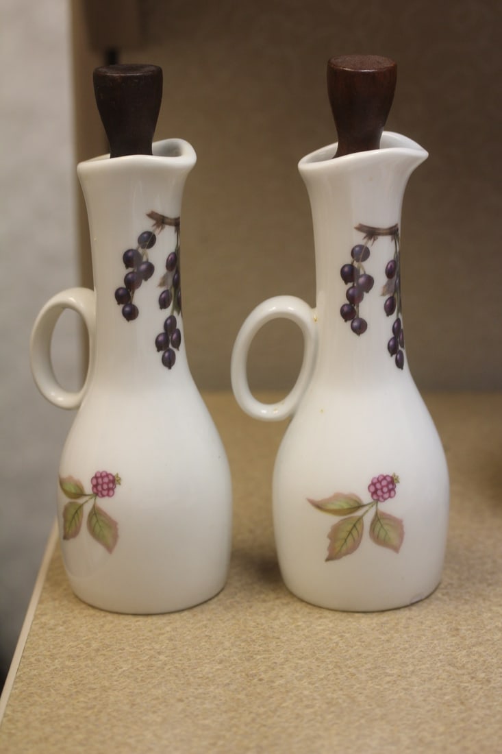 Pair of Ceramic Sauce Bottle: please note: one has a chip - 7" tall