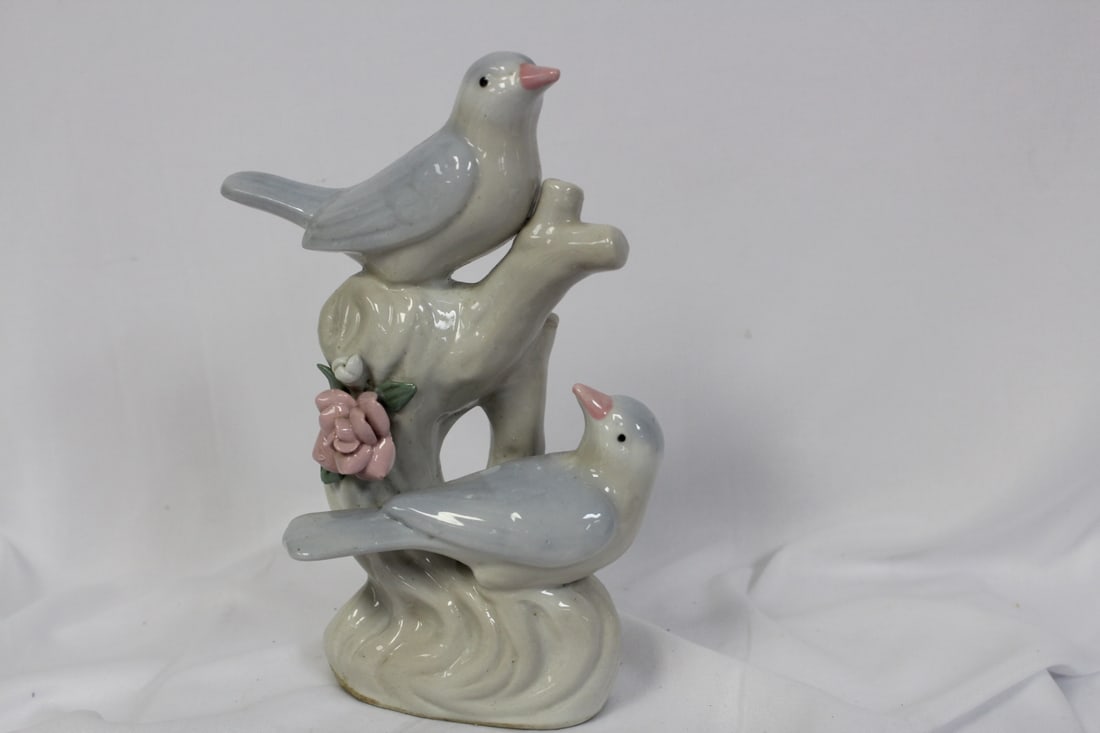 A Ceramic Bird Group: made in China - 7 3/4" tall