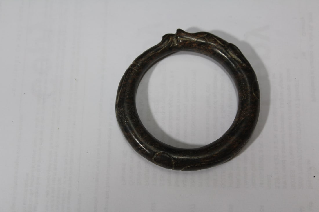 A Jade or Similar Hardstone Bangle Bracelet: 2 1/8" inside diameter