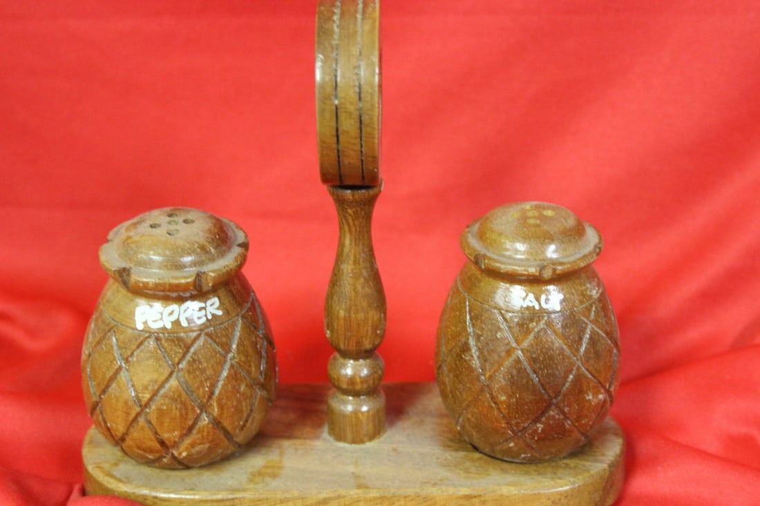 Pair of Salt and Pepper Shakers: on a stand together - with stand= 6 3/8" long
