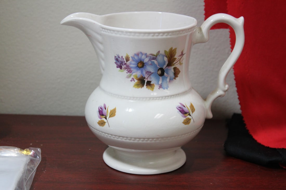 A Ceramic Pitcher: please note: faint hairline - 5 5/8" tall