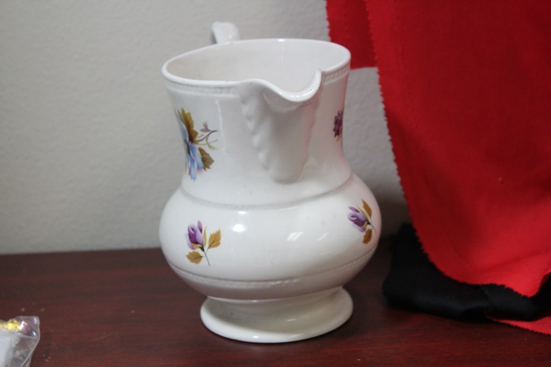 A Ceramic Pitcher - 4