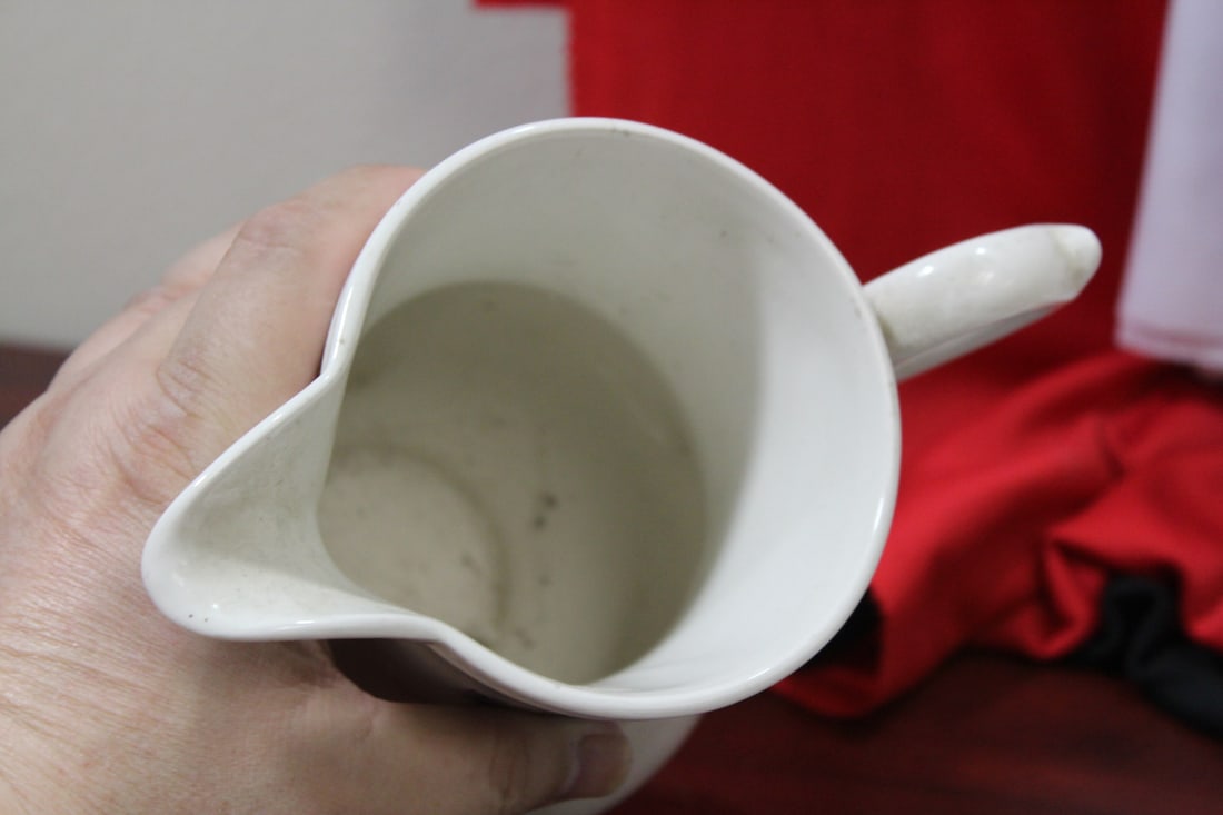 A Ceramic Pitcher - 5