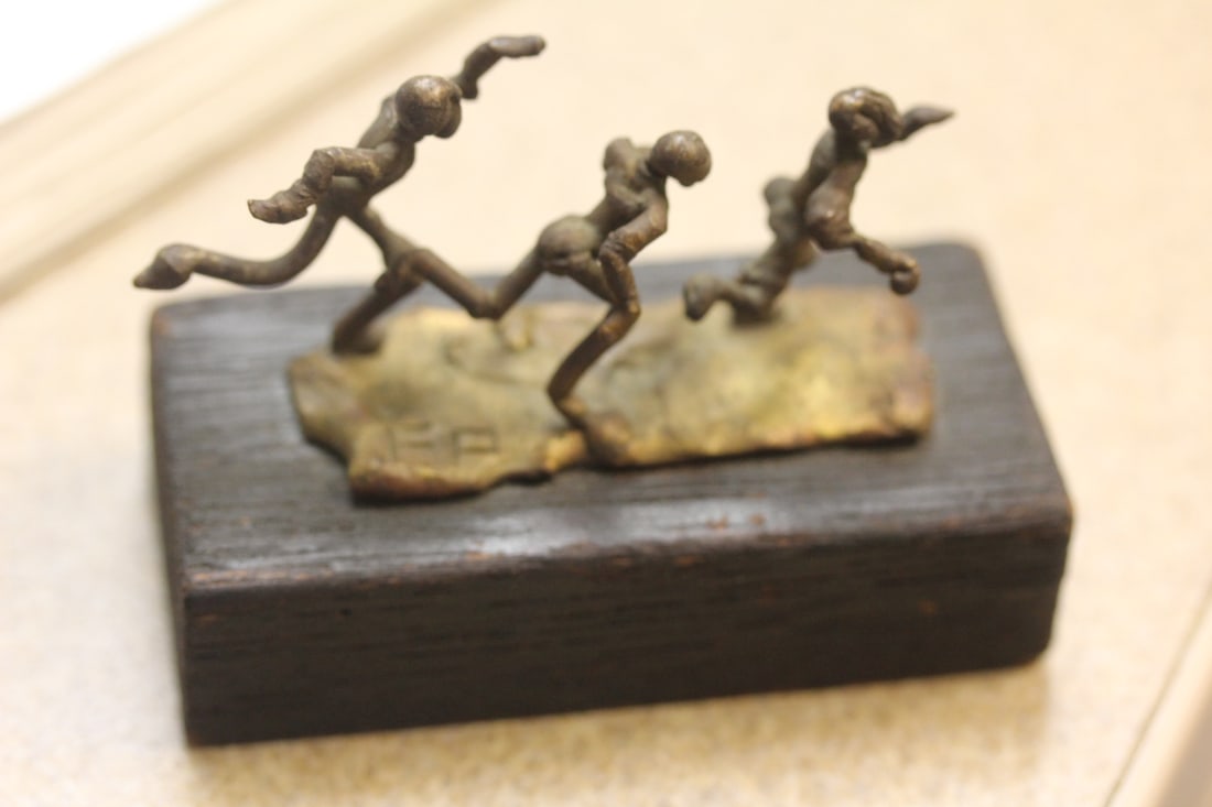 Signed FP Dancers(?) on Wood: 3 inches across
