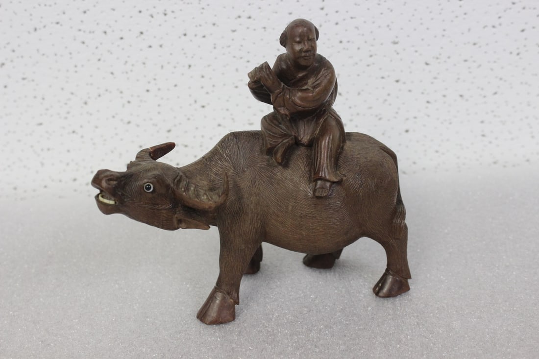 A Vintage Chinese Wooden Cow with Rider: Probably missing the flute - 5 5/8" long