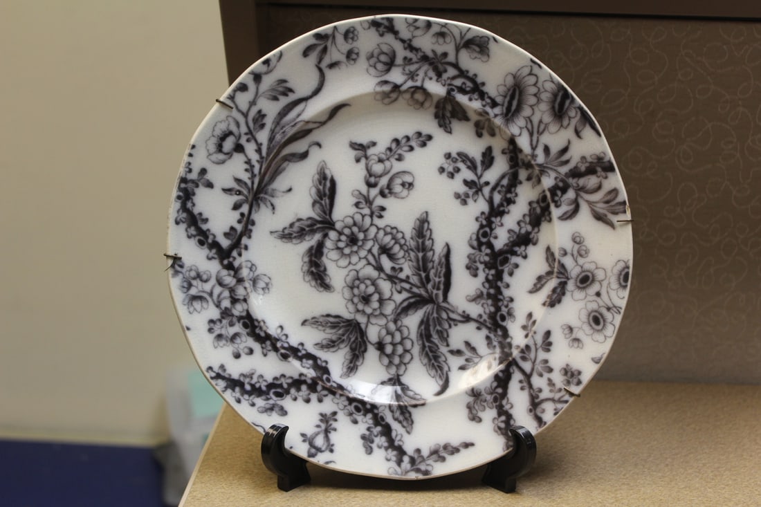 Antique Flow Blue or Flow Black Plate: 19th century - 10 3/8" in diameter