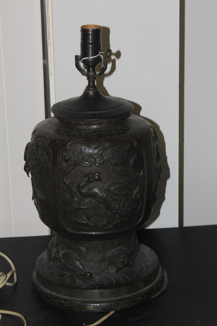An Antique Japanese Bronze Lamp Base: repousse - three dimensional bird motif - overall= 17 3/4" tall