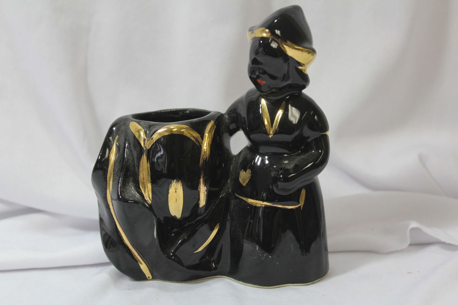 A Black Ceramic Planter: 5 1/2" tall