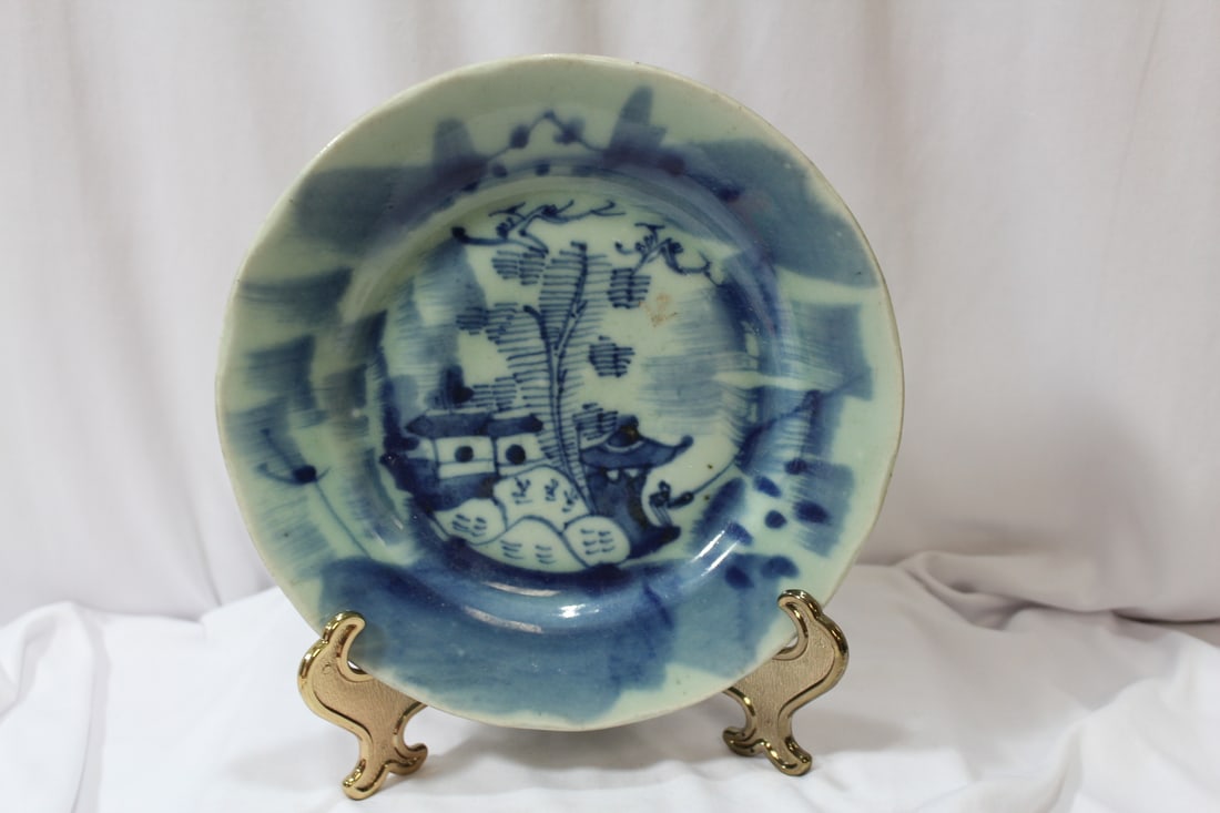 An Antique Chinese Blue And White Plate: 19th century - signed on the bottom - 9" in diameter
