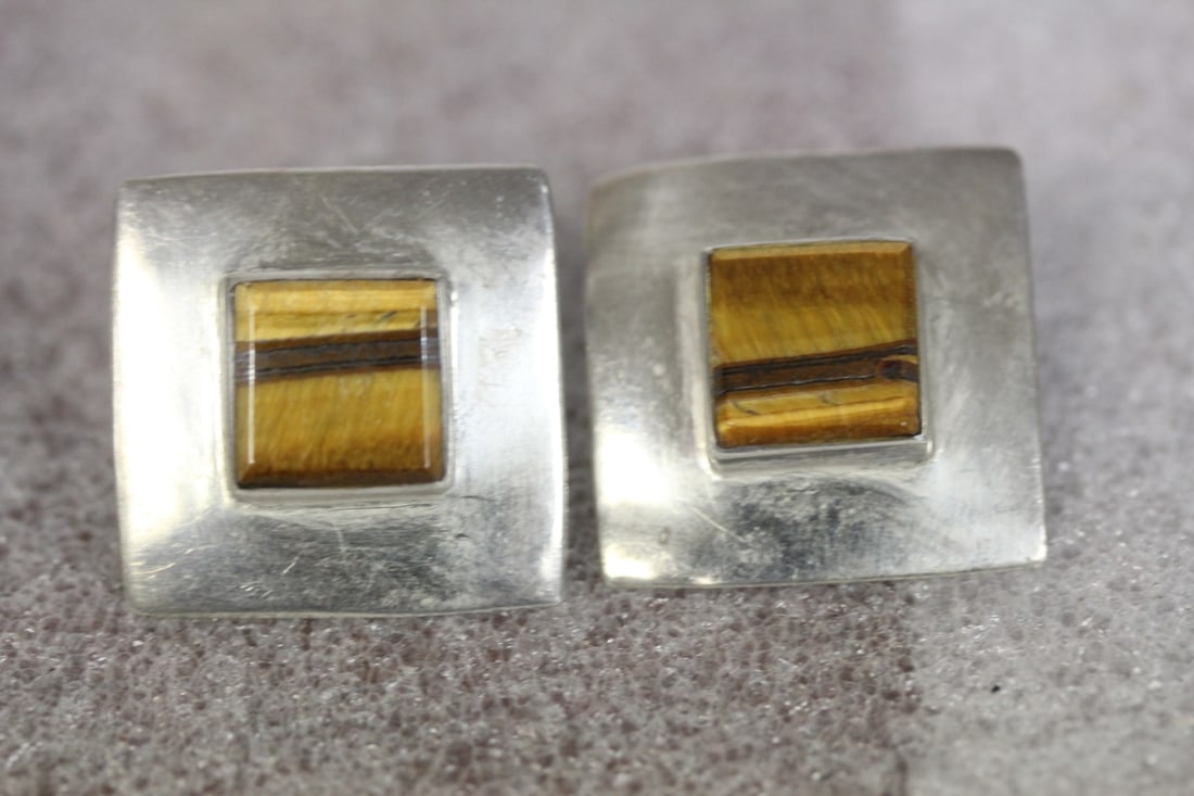 A Pair of Sterling and Tiger Eye Earrings: as shown