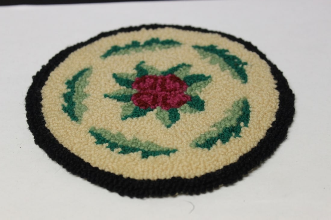 A Vintage Miniature Round Rug: 6" in diameter