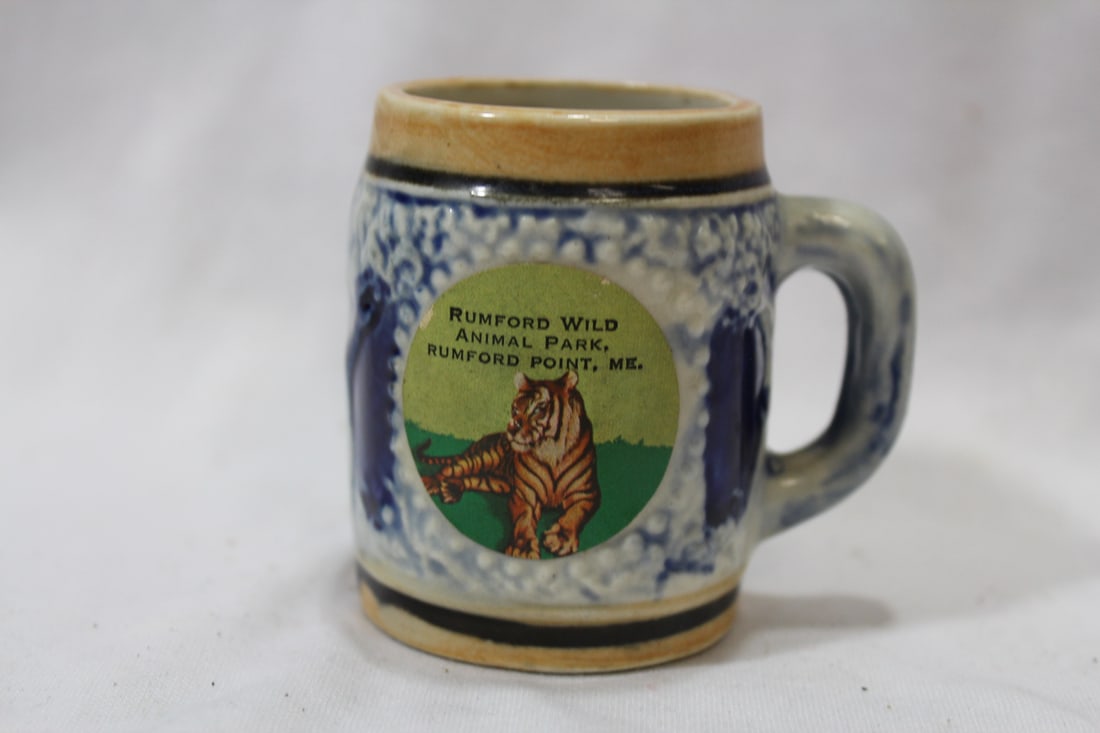 A Miniature Ceramic Mug: 2 1/2" tall