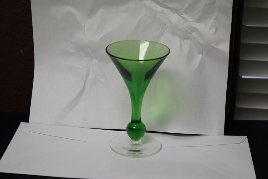 A Small Green Glass Flute?: 4 inches tall