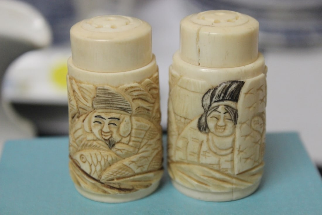 Set of 2 Japanese Bone Salt and Pepper Shaker: Carved - each measures 2 inches tall - please note splits on top, due to age