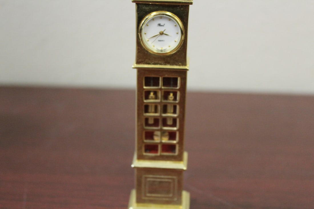 A Metal Grandfather Style Quartz Clock: gold gilted - 5 1/4" tall - needs battery