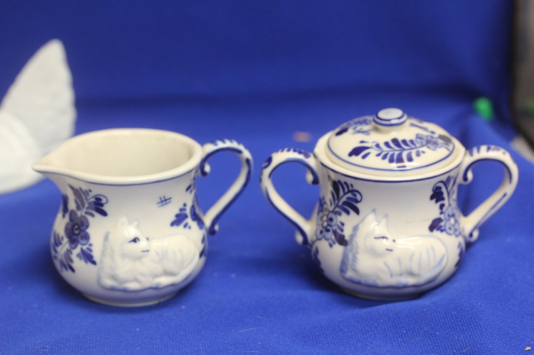 A Delft Sugar and Creamer Container: sugar= 4 1/2" across - cat motief