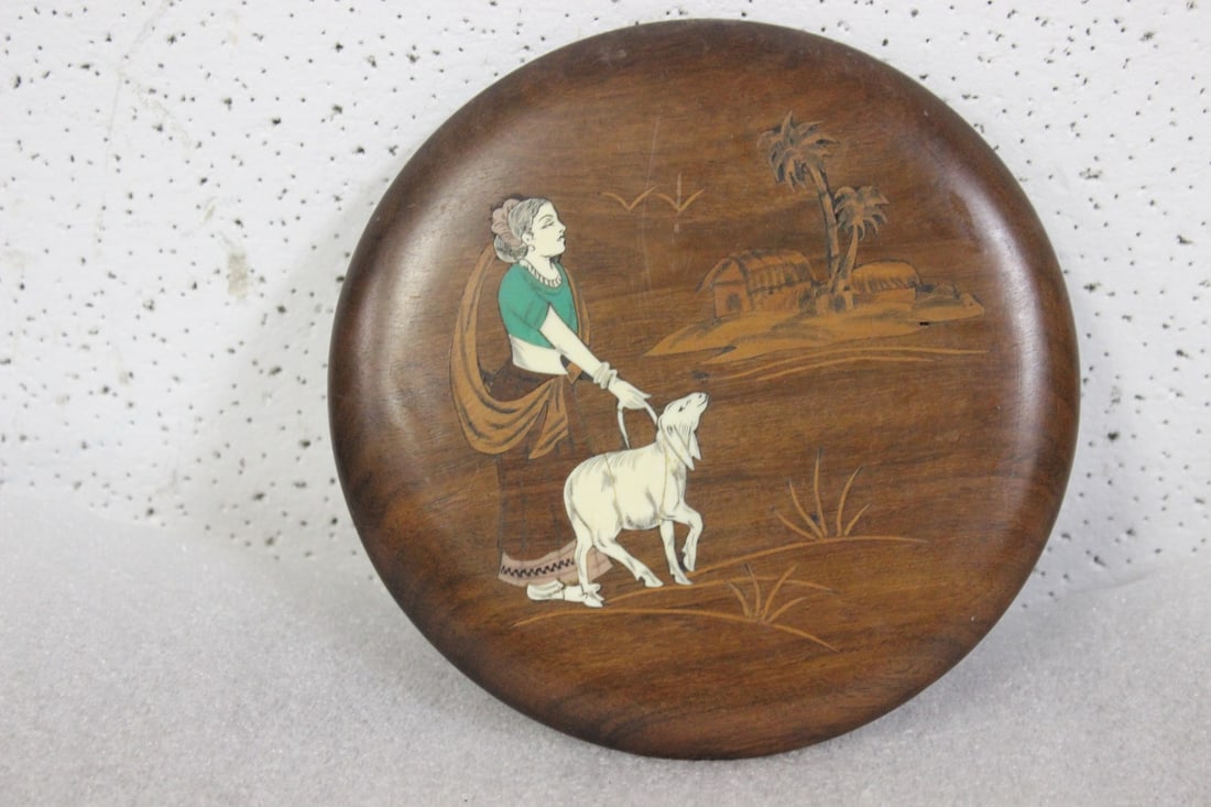 A Wooden, Bone Inlaid Wall Hanger: 5 7/8" in diameter