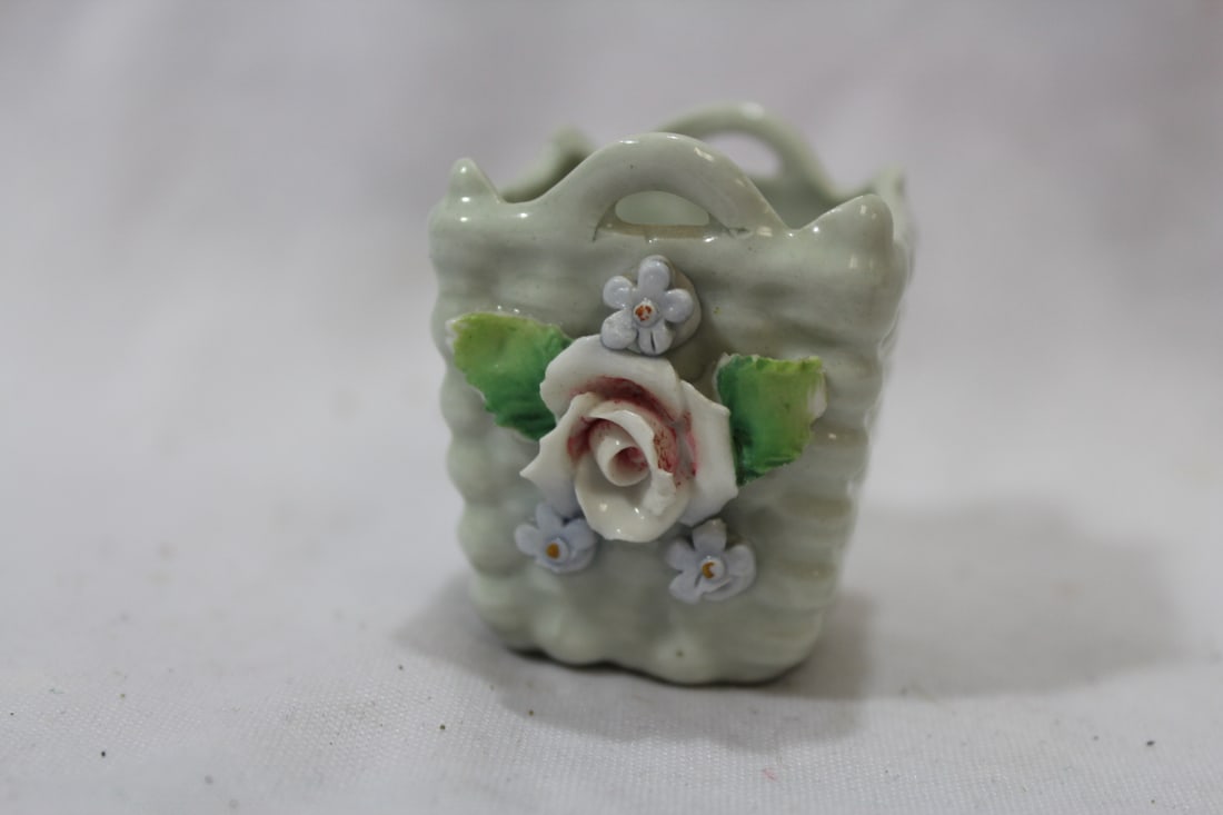 A Miniature Ceramic Basket: 1 7/8" tall
