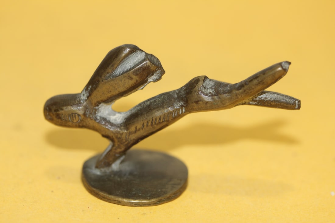 A Bronze Leaping Rabbit: marked China - 2 3/8" across