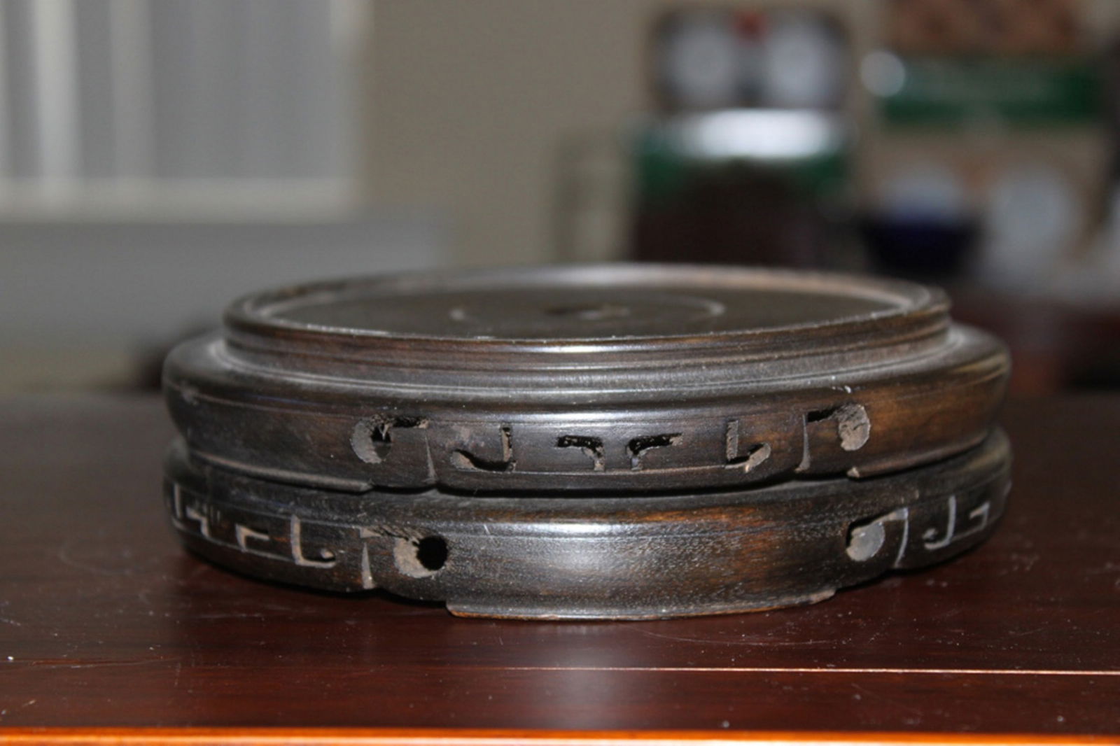 Unusual Chinese Vintage Wood Stand: Very unusual carving. Circa early 20th century. Measures 4 3/4" inside diameter.