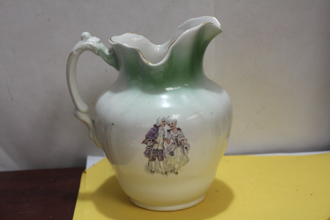 A German Ceramic Pitcher: 7 1/4" tall