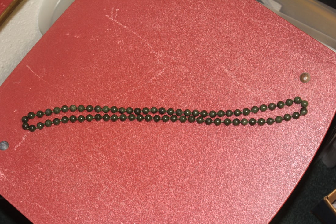 Strand of Nephrite Jade Bead Necklace: 16 inches long - each bead= 8mm