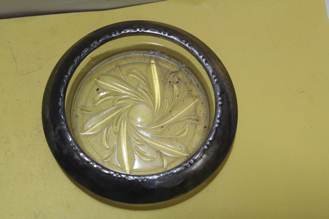 A Sterling Rim Coaster: 3 3/4" in diameter