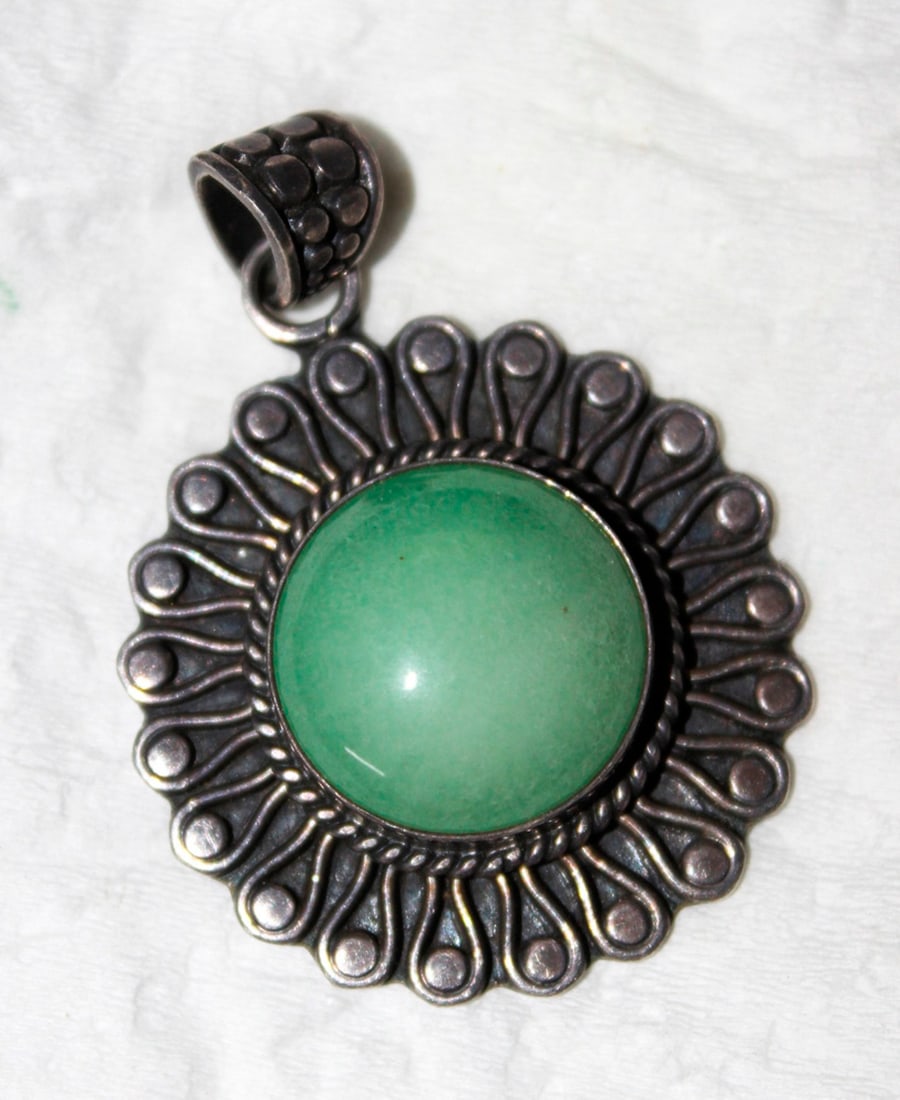 Sterling and Apple Green Jade / Jadeite Pendant: vintage - Marked 925 on the back. Measures 1 3/4" including bail.