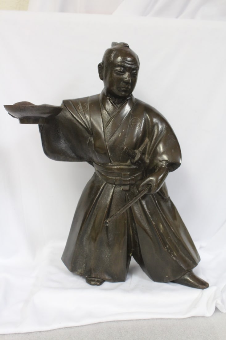 A Vitnage Japanese Cast Iron Samurai: Probably mid 20th century - 15 1/2" tall - please note: the stick is most likely a replacement