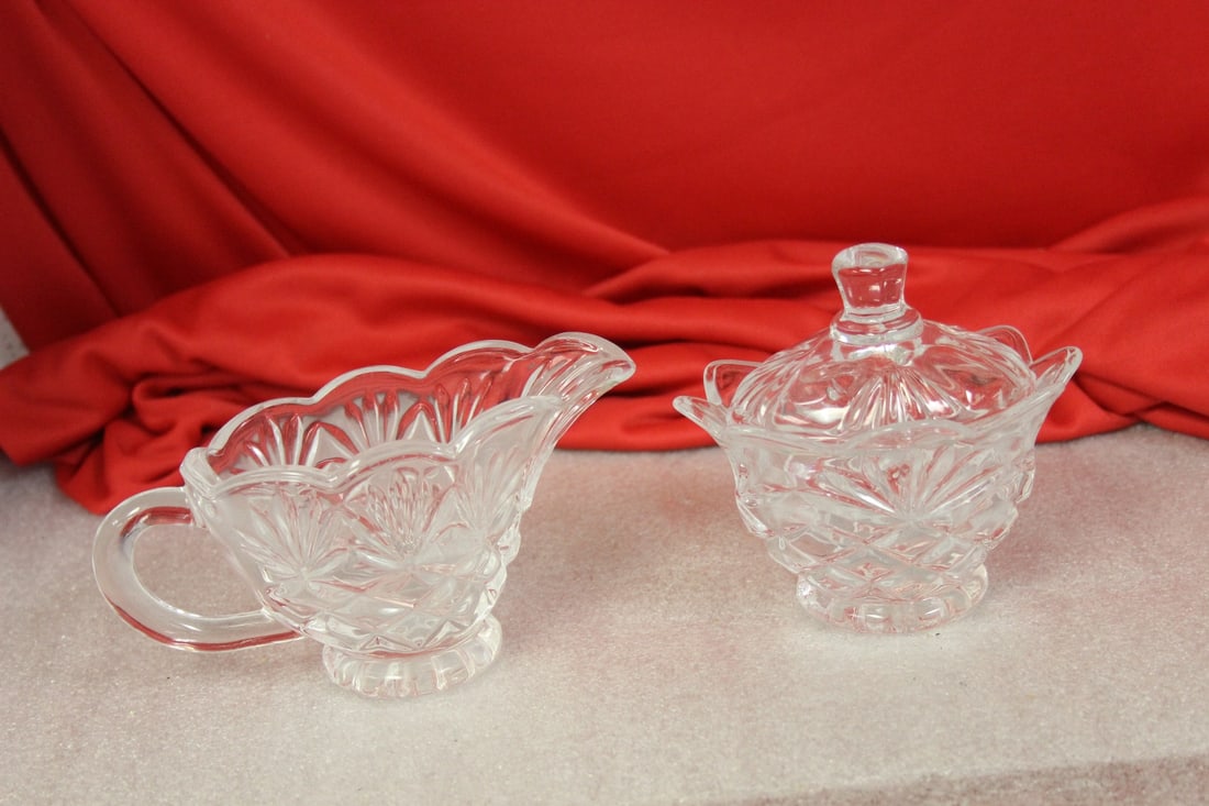 Lot of Two Pressed Glass Sugar and Creamer: widest - 6" in cluding the handle