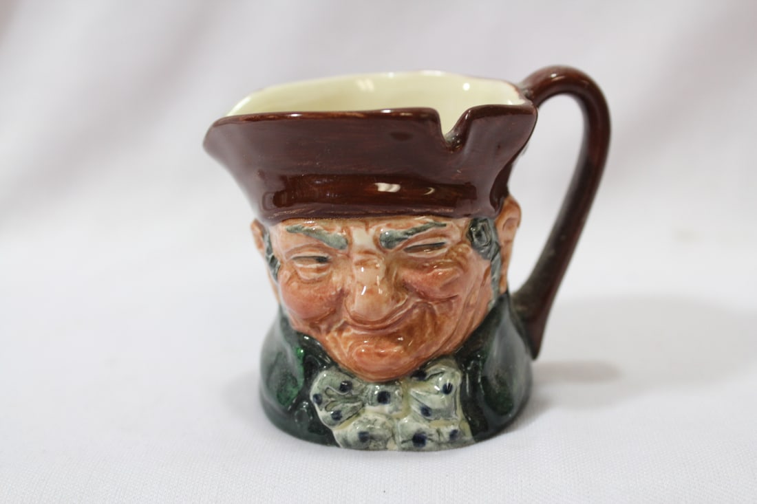 A Royal Doulton Miniature Mug: 2 1/4" tall