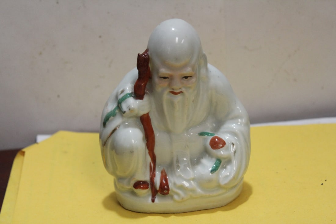 An Antique Chinese Ceramic Sage: 5 inches tall - signed