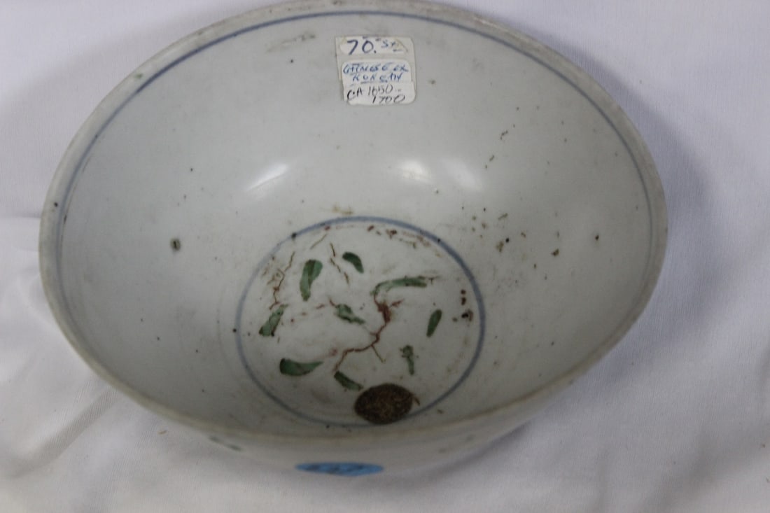 A 17th Century Chinese Bowl: deformed - signed - 7 1/4" in diameter