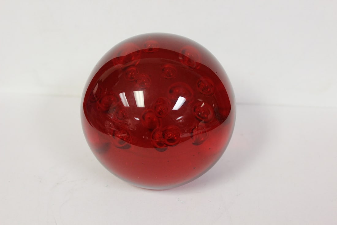A Red Bubble Glass Weight: 4" in diameter