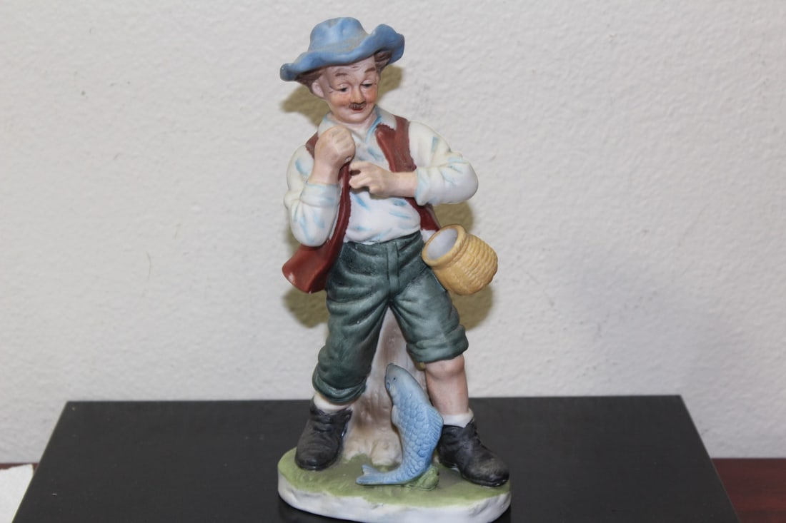 A Korean Figurine: probably missing a fishing pole - 7 3/8" tall