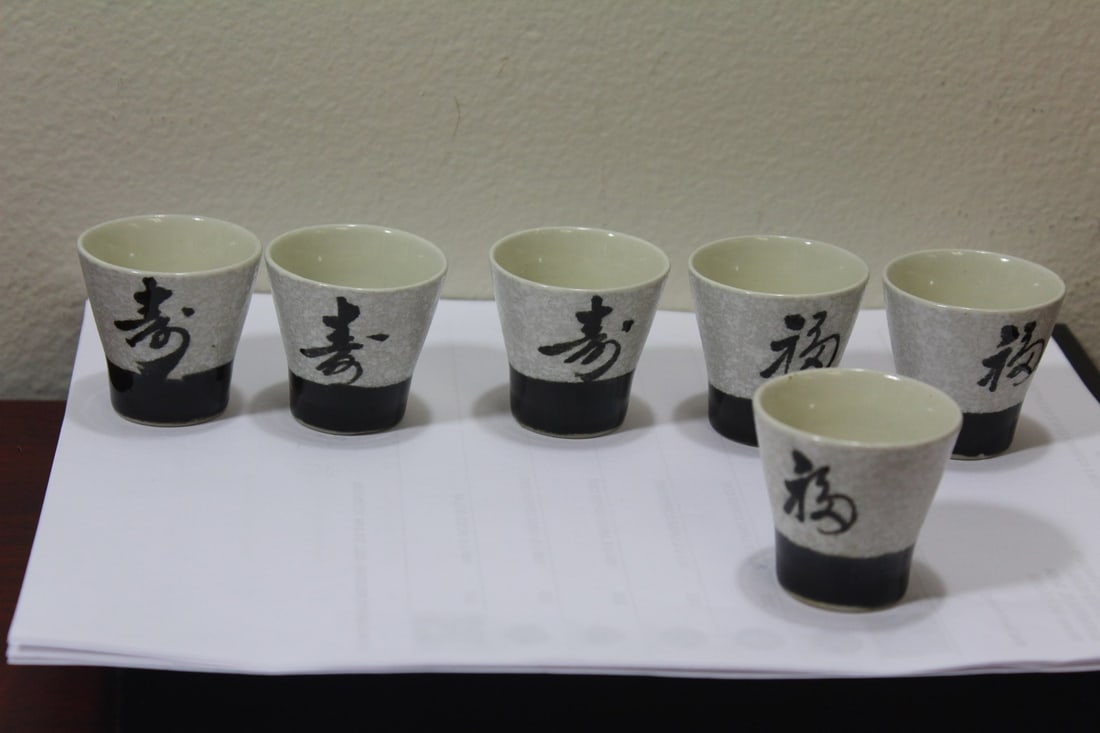 A Lot of Set of 6 Saki Cups: Japanese Ceramic character - 1 3/4" tall each