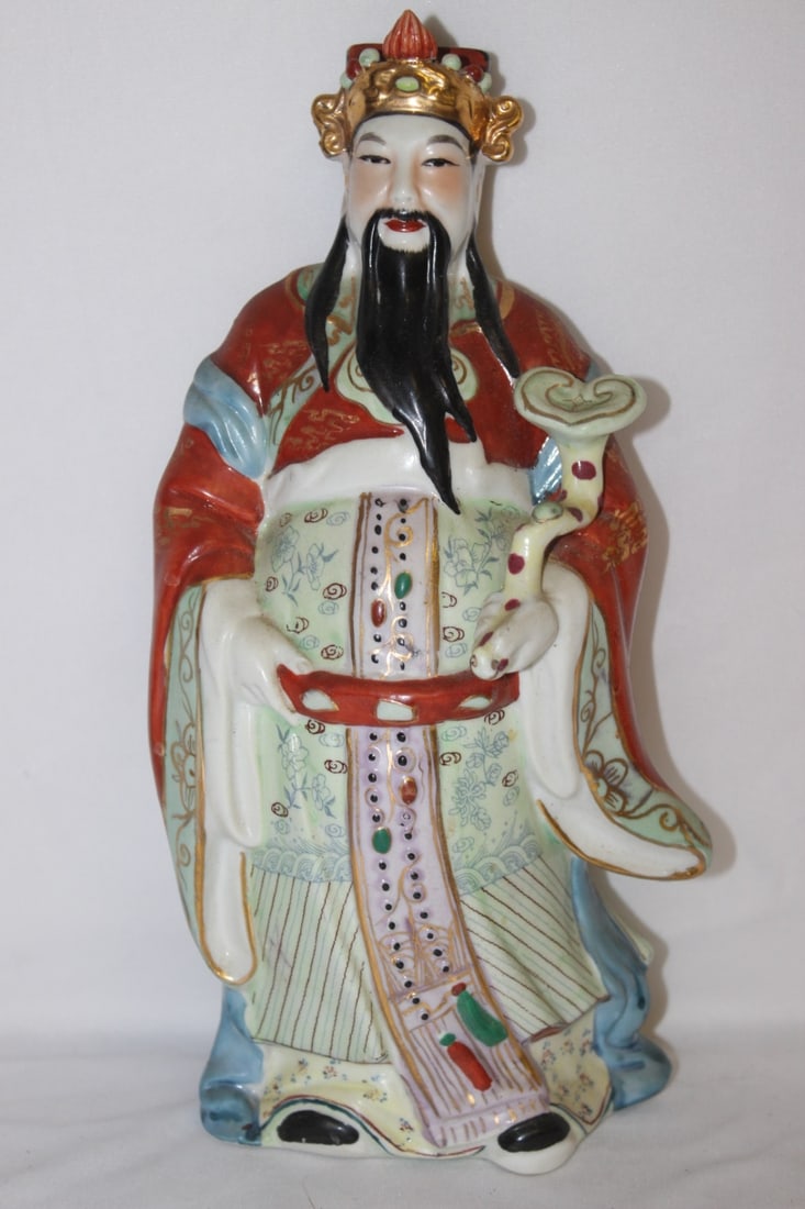 A Chinese Porcelain Man: 11" tall