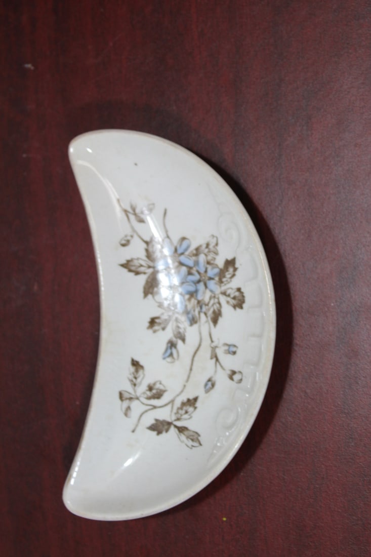 A Vintage Half Moon Ceramic Dish: 7" across